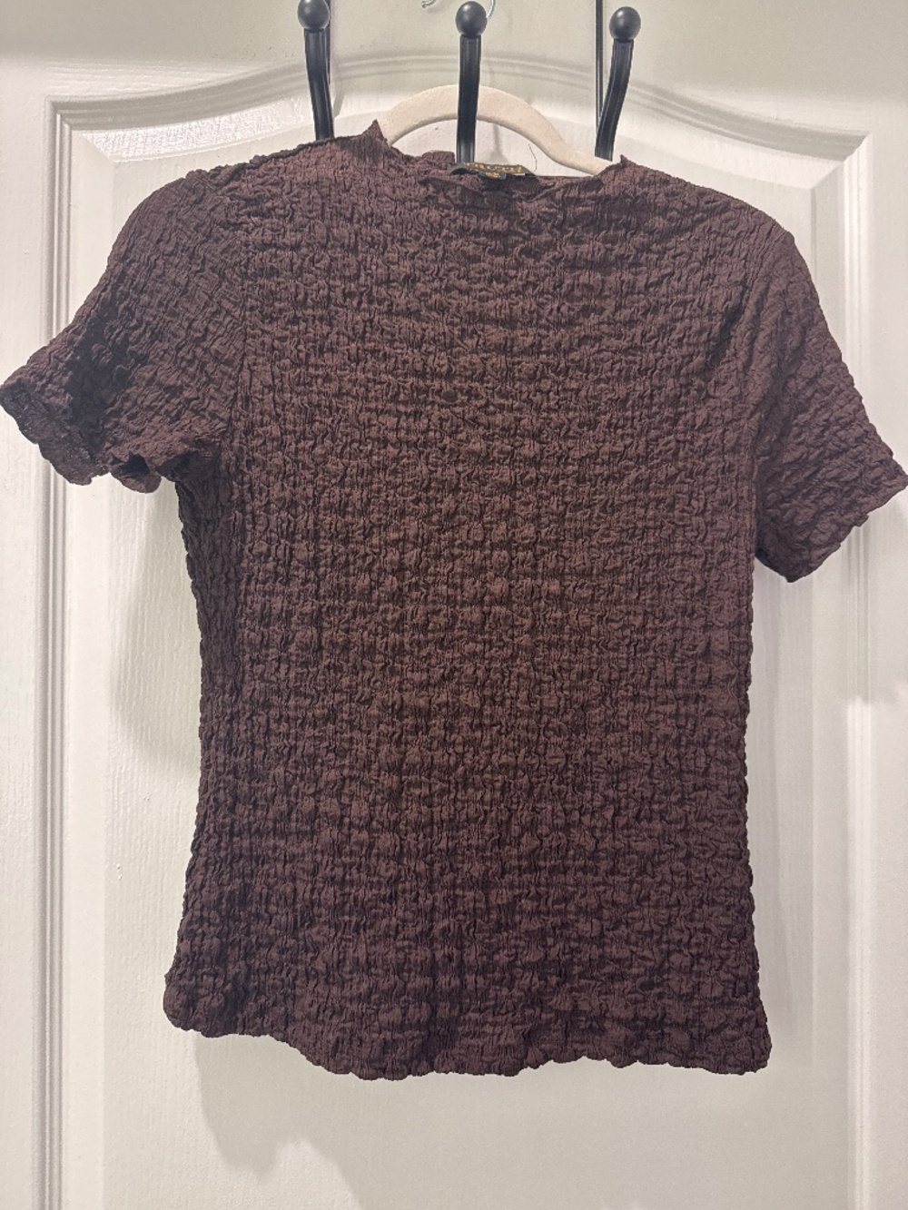Brown top with rushing